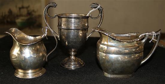 George III silver cream jug, London 1754, a Mappin & Webb silver cream jug and a silver trophy cup